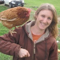 Bri with chicken on her shoulder.