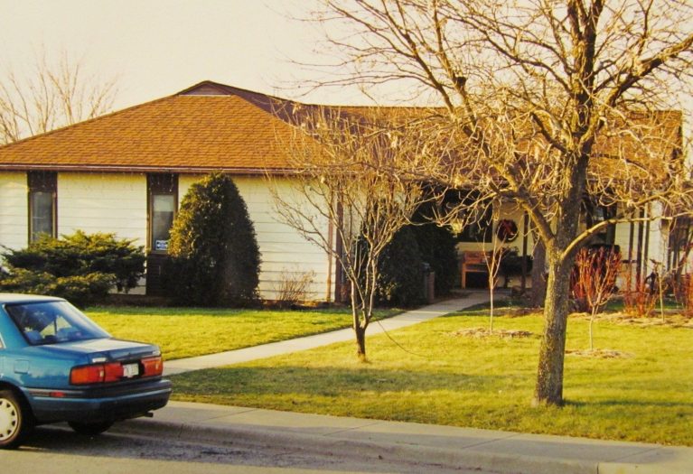 Ho.me of Midwest Permaculture in 1988 - a standard American lawn with a few trees and shrubs